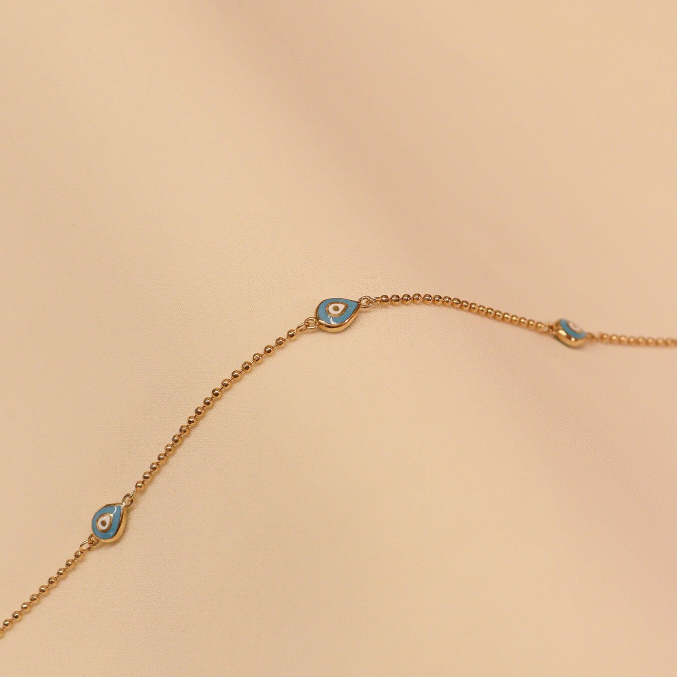 Golf Zincirli Üç Damla Mineli Göz Modern Bileklik