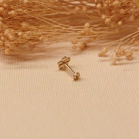 Flora Tragus Piercing