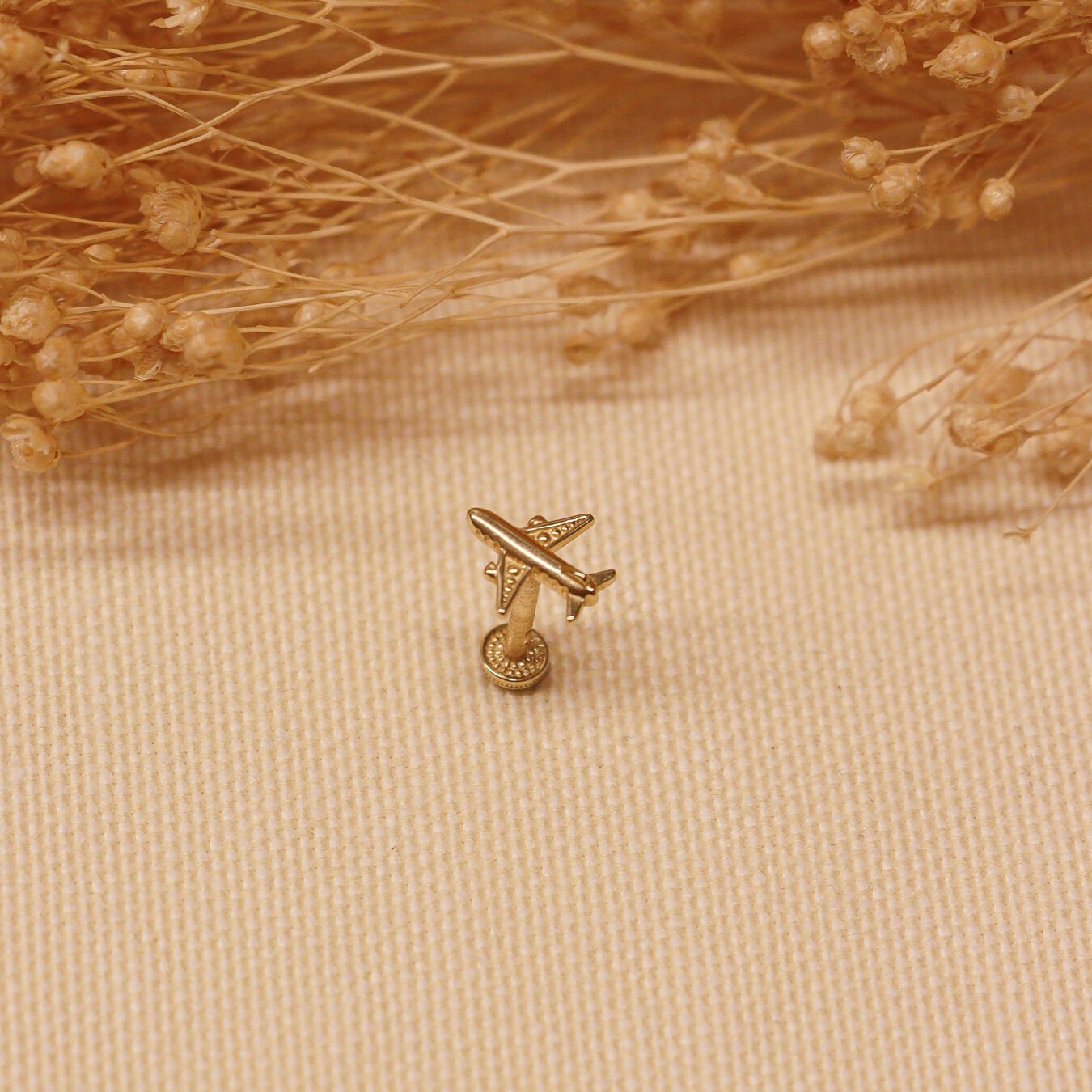 Uçak Tragus Piercing